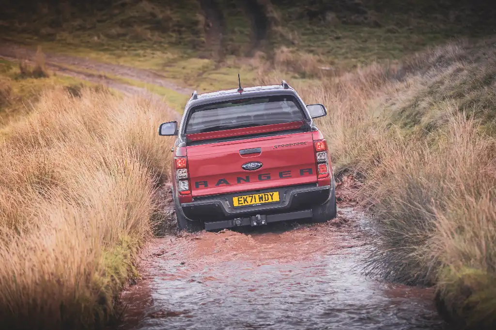 Ford Ranger Stormtrak rear view leaving a pool of water