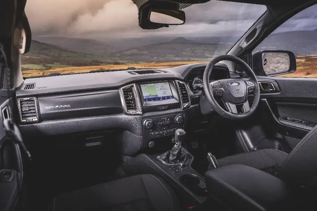 Ford Ranger Wolftrak cabin with a view of the Welsh countryside through the windscreen
