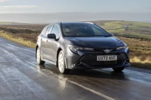Toyota Corolla Commercial Hybrid in Decuma Grey on the road