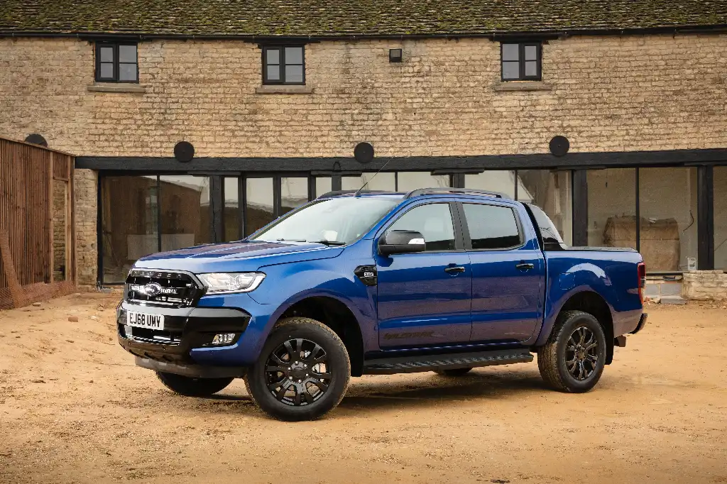 Ford Ranger Wildtrak X parked in front of a converted farmyard buliding 