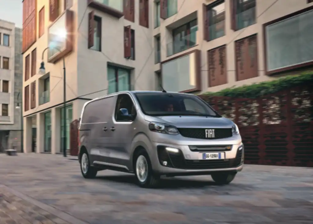 Fiat Scudo in front of an apartment block to show the dimensions of the van