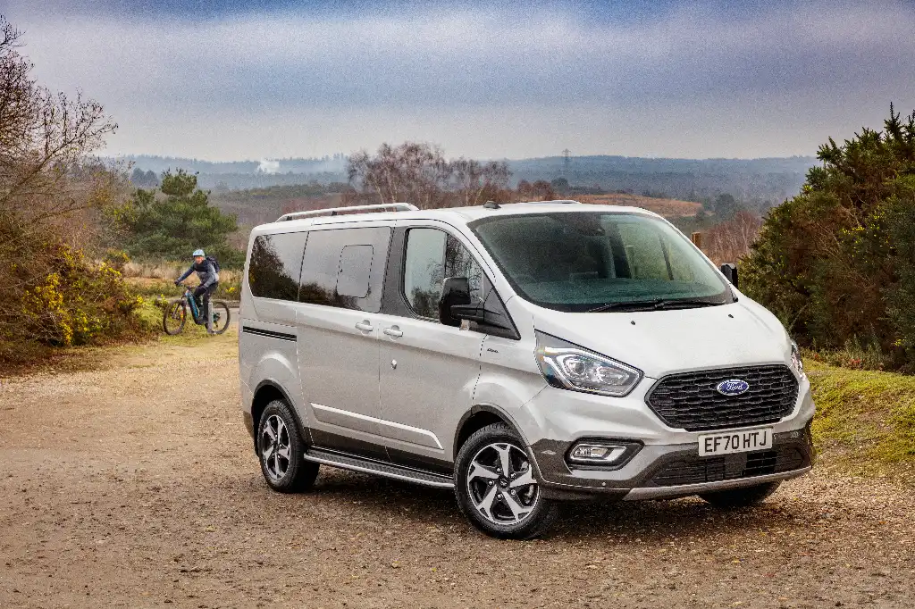 Ford Transit Custom Active with mountain biker in the background