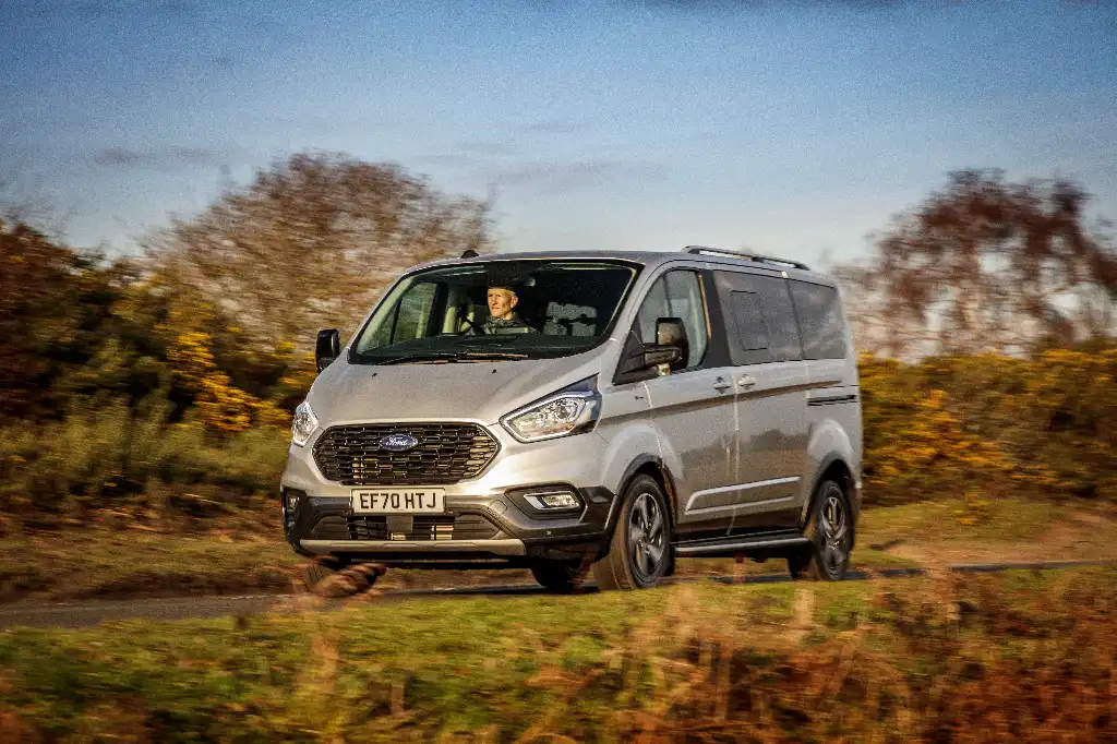Ford van being driven on the road in the countryside