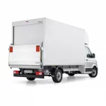 Rear view of a Luton van in white with a roller shutter door and a tail lift built on a Volkswagen Crafter chassis