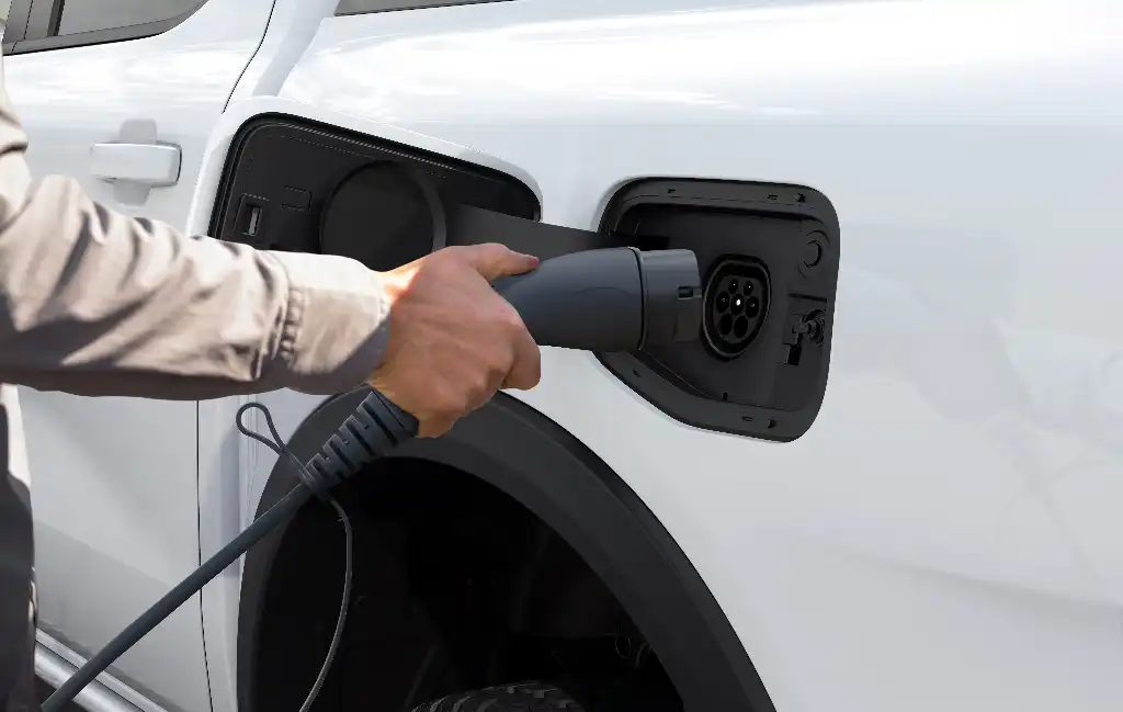 electric vehicle charging capable being plugged into a pick-up truck