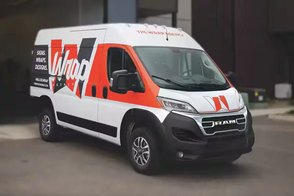 RAM ProMaster 1500 towing capacity van in a body in white with a red and grey livery for Wrap Agency