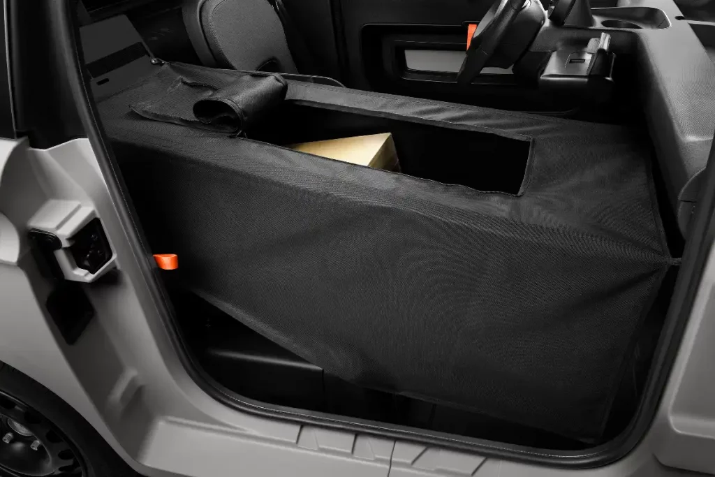 cargo area cover with zip hatch