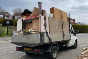 van filled with rubbish possilbly overloaded