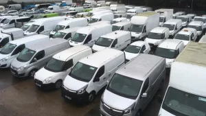 Parked vans in car park ahead of an auction sale