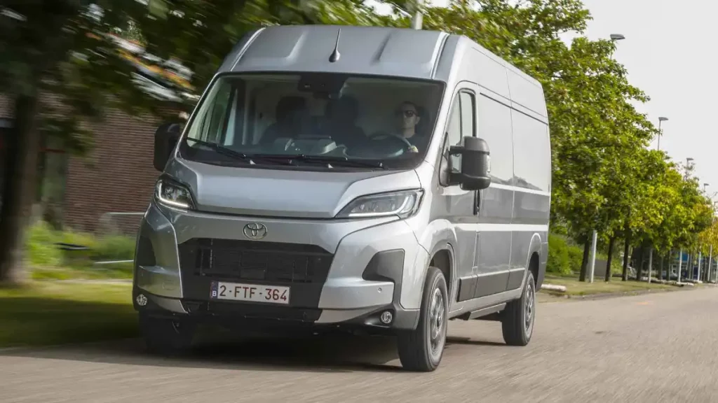 Toyota Proace Max van weight van on the road with tree background