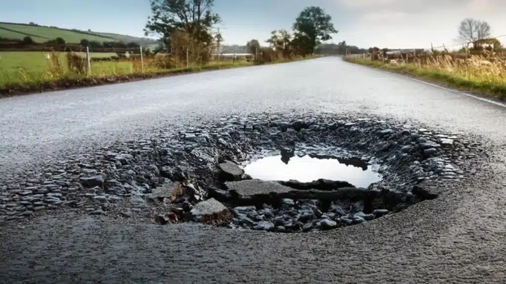 UK road with large pothole