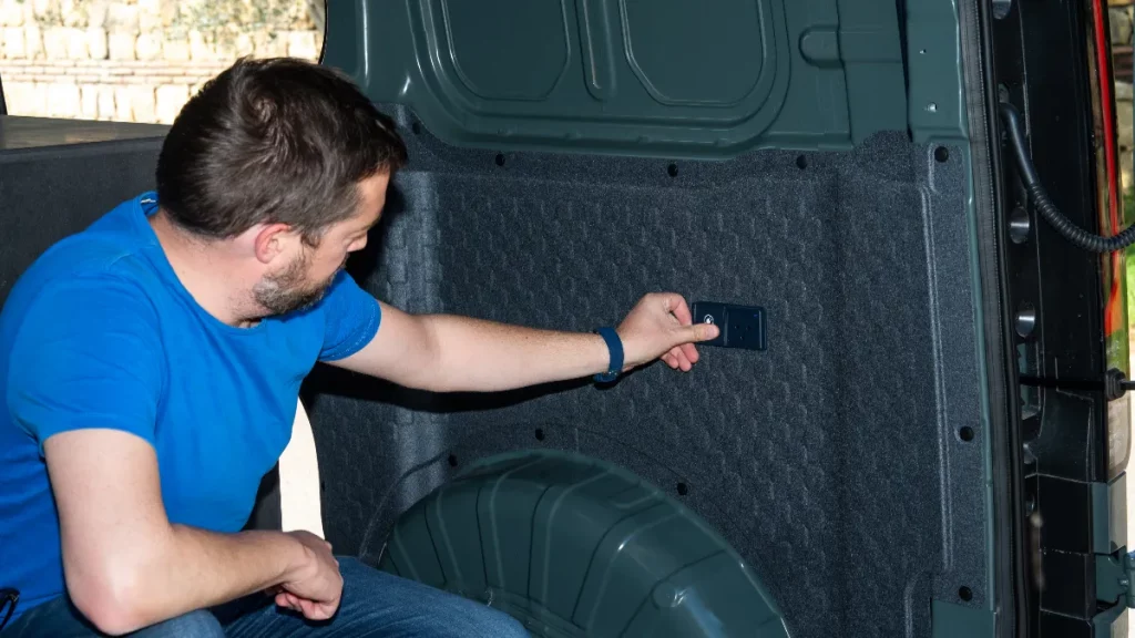Rear loadspace of PV5 cargo with charging sockets