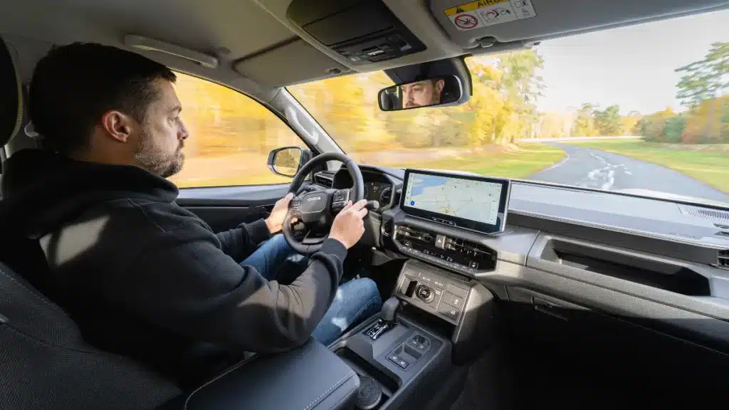 George Barrow driving Toyota Hilux BEV
