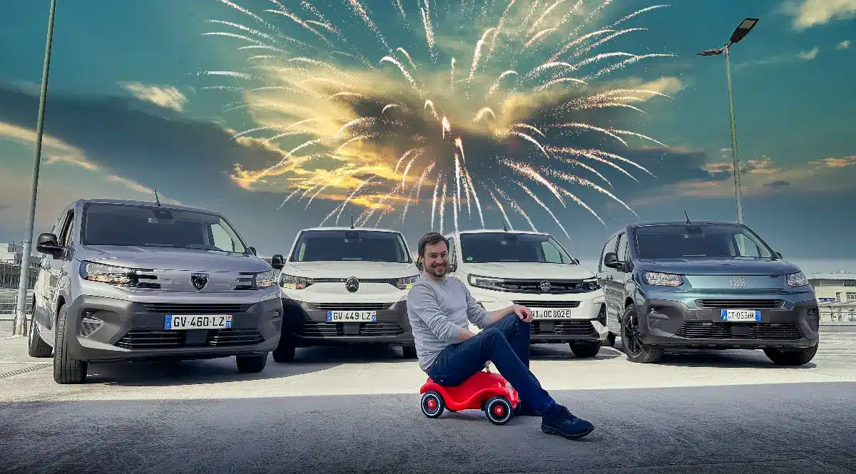 New vans with George Barrow on a toy bike and fireworks