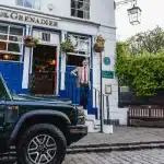 Grenadier outside The Grenadier with Sir Jim