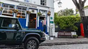Grenadier outside The Grenadier with Sir Jim